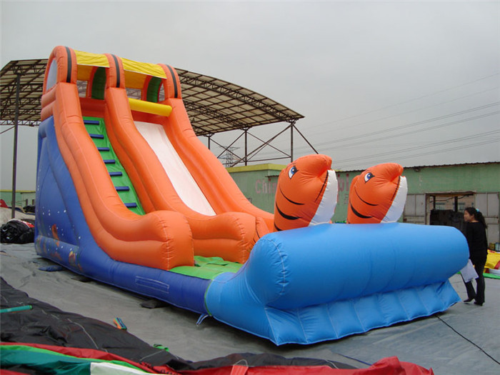 Quality Rotating Large Inflatable Slide With Inflatable Trampoline Jumping Bouncer for sale