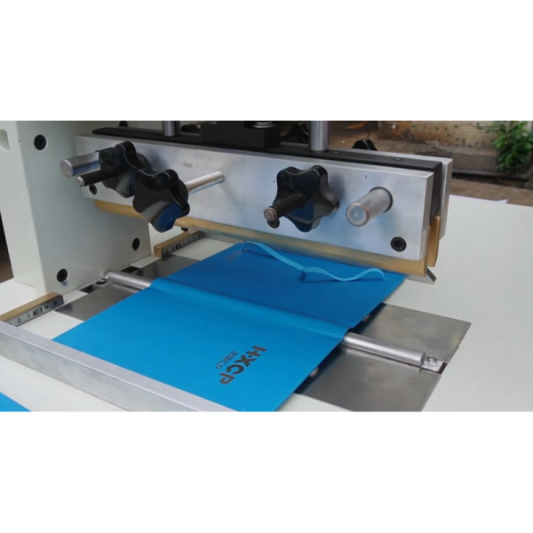 HX700CBR Hardcover Case Back Rounding Machine pneumatically rounds spines with heated molds and easy manual feeding