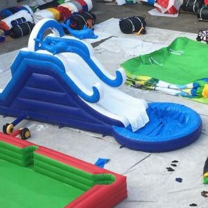 Wholesale Blue Wave Inflatable water slides climbing wall With Pool Cartoon Theme from china suppliers