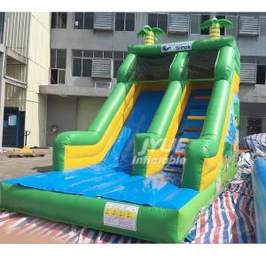 China 0.55mm PVC Castle Bounce House With Slide Jungle Animal Theme Inflatable Slide on sale