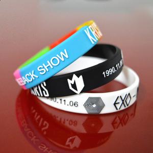 China Embossed with color silicone bracelets wristband on sale