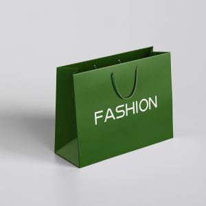 China Christmas Paper Gift Bag with Your Own Logo Made of Ivory Board and Customized Design on sale