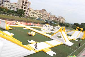 China Gaint Yellow And White Floating 0.9mm PVC Outdoor Inflatable Water Park Equipment OEM/ODM on sale