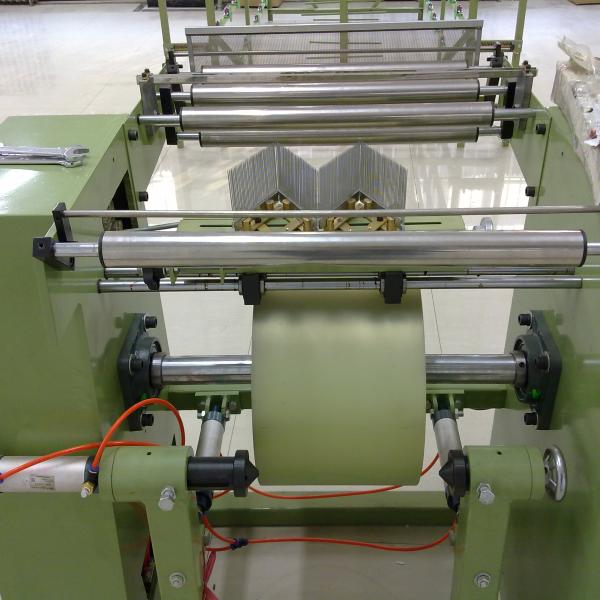Pneumatic warping machine