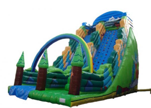 Quality Green Forest Theme Blow Up Slide , Giant Inflatable Slide With Climbing Wall for sale